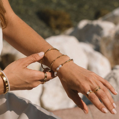 Figaro Gold-Tone Knot Chain Bracelet