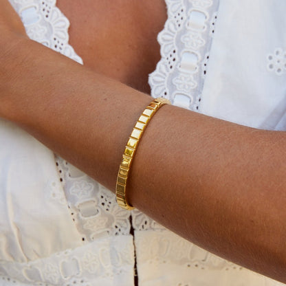 Tasha Ribbed Gold-Tone Bangle